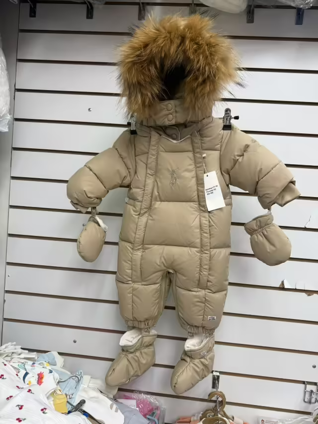 Зимние женские комбинезоны