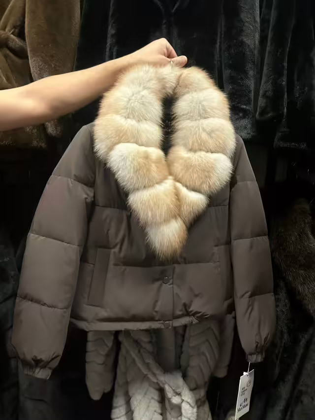 Зимние женские пуховики