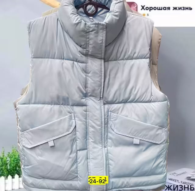 Женские жилетки