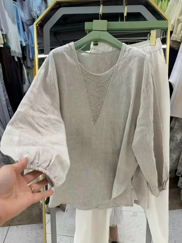 Женские блузки