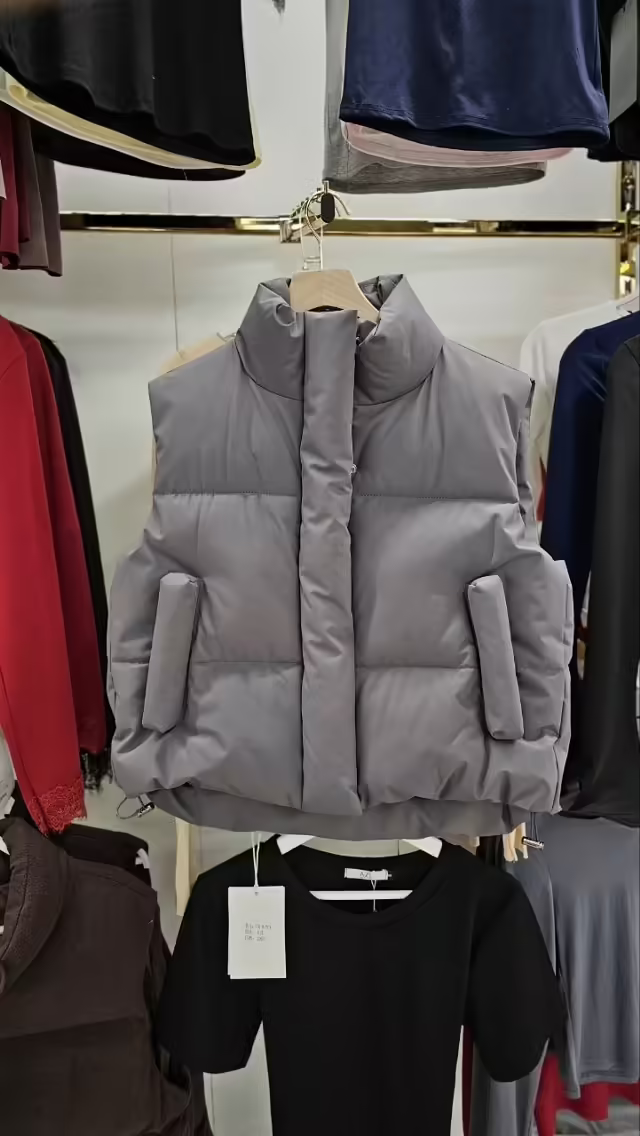 Женские жилетки