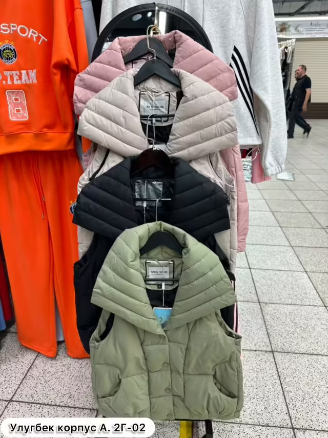 Женские жилетки