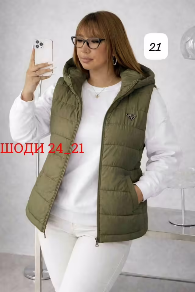 Демисезонные стильные женские жилетки больших размеров. фото 2