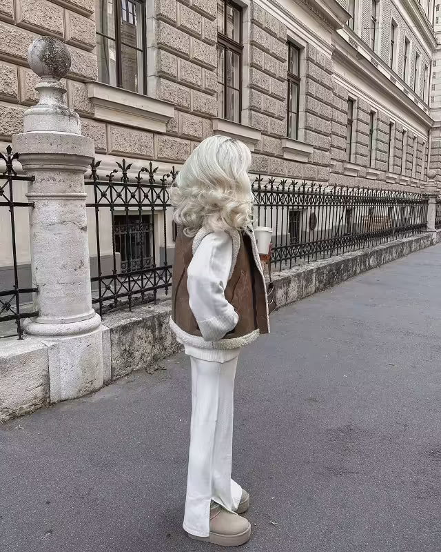 Женские жилетки