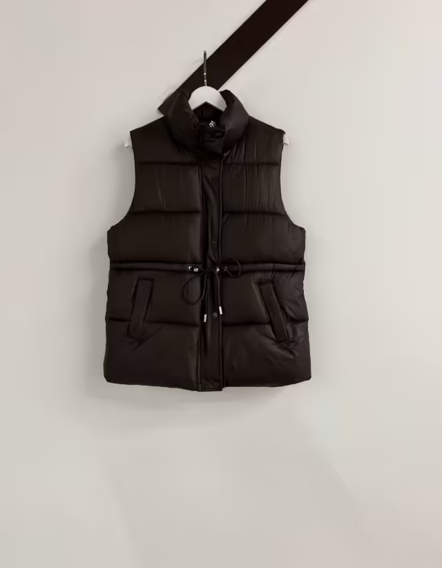 Женские жилетки
