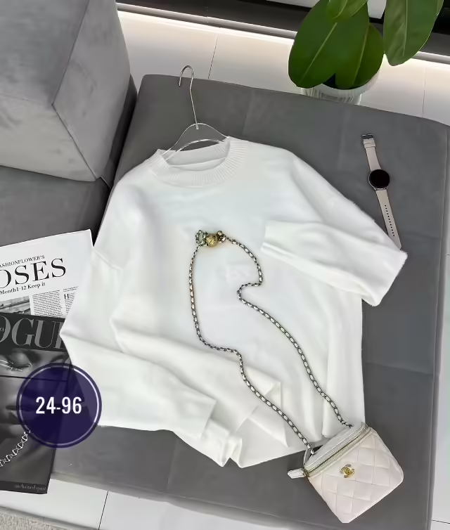 Вязаные модные стильные женские свитера. фото 2